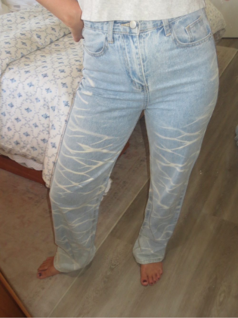 The Kript Light Wash Straight Leg Jeans with White Wave Accent